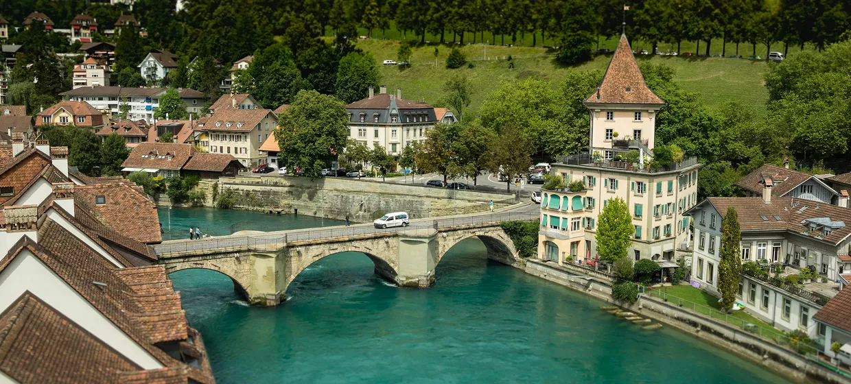 A scenic view of a river flowing through a town